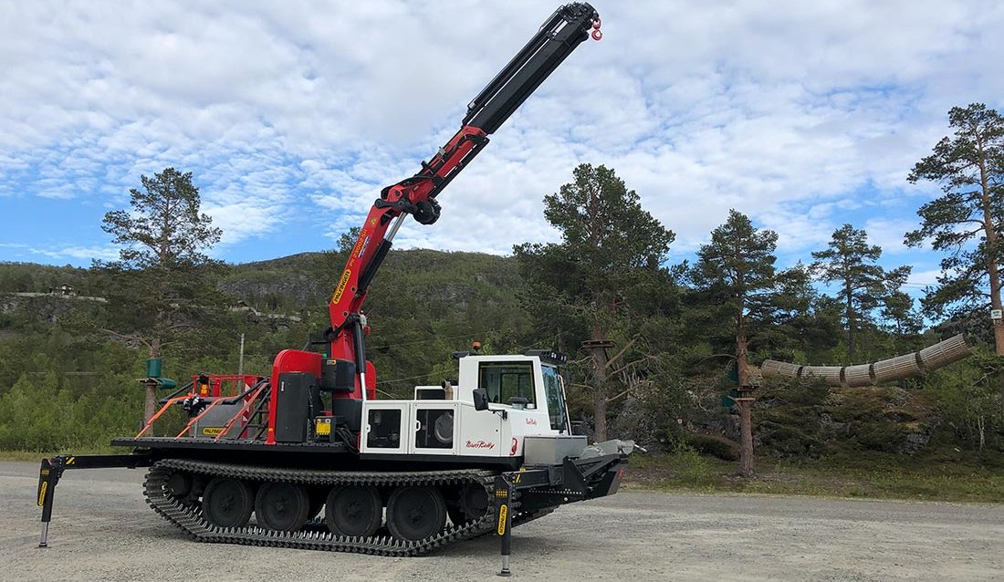 Kässbohrer PowerBully 18T beltemaskin med kran